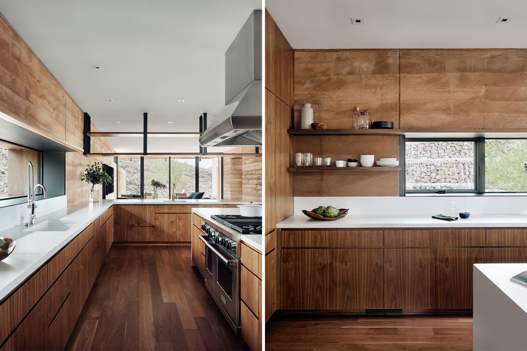 Interior kitchen views, boast of rammed earth walls, wood clad cabinetry and large windows with views to desert. 
