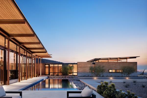 Horizon House uses rammed earth as the primary material which is designed to reflect the surrounding natural topography.